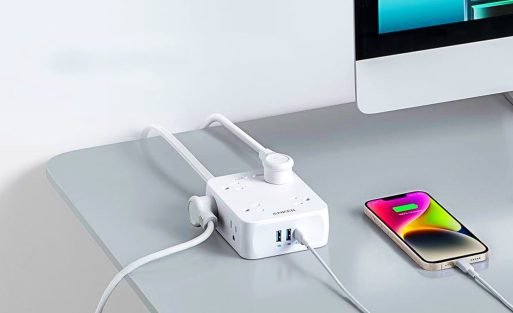 anker-341-usb-power-strip-on-a-table-charging-a-phone-and-giving-energy-to-a-computer.jpg
